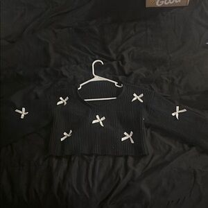 Black Sweater with White Bows